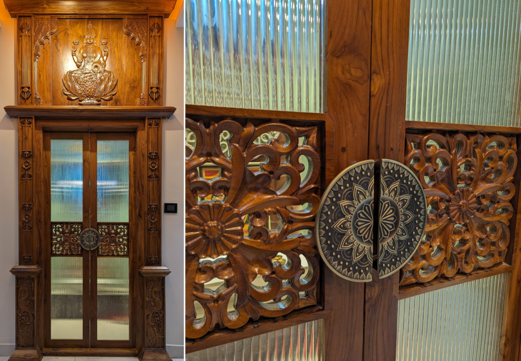 pooja room teak door, Goddess  Lakshmi carving at top, fluted glass frame