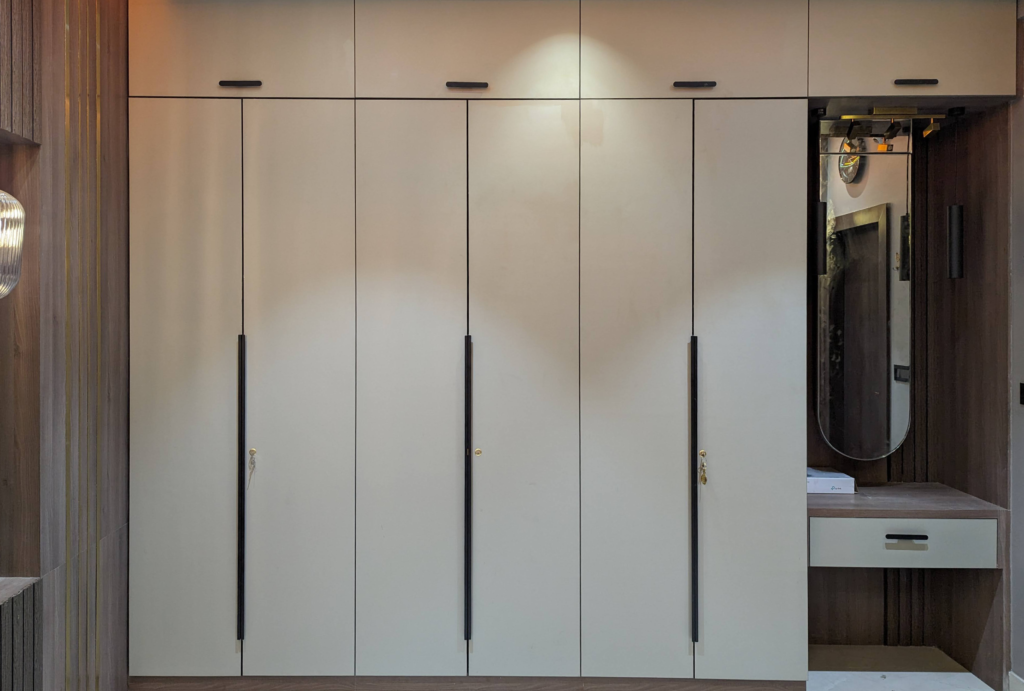 wardrobe, MBR Wardrobe, laminate wardrobes, long doors, sleek wardrobe with dressing area, master bedroom design