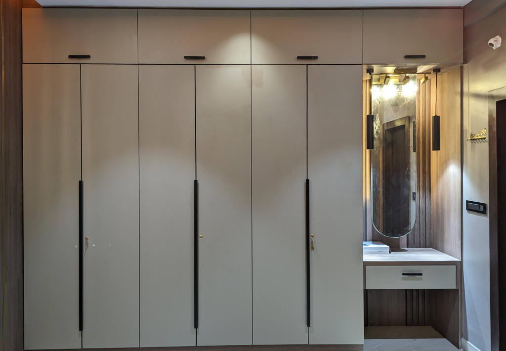 wardrobe, MBR Wardrobe, laminate wardrobes, long doors, sleek wardrobe with dressing area, master bedroom design